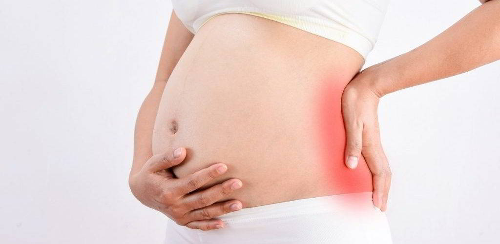 Mal di schiena in gravidanza: consigli per la prevenzione e la cura - IVI  Italia